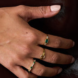 EAST WEST EMERALD RING