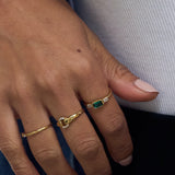 EAST WEST EMERALD RING