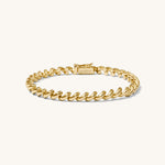 Gold bracelet on a white background