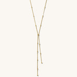 Gold necklace on a white background