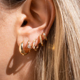 14K SOLITAIRE TWIST EARRING