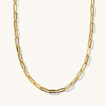 A gold-colored chain necklace with a series of linked segments.