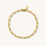 A gold-colored bracelet with a lobster clasp closure.