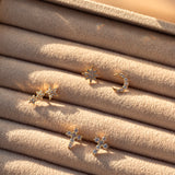 14K CROSS DIAMOND EARRING